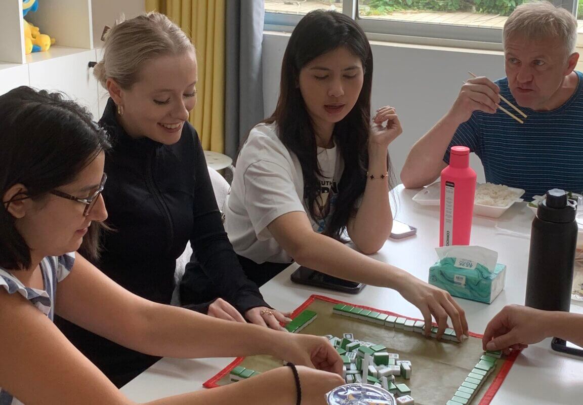 Playing Mahjong at lunch