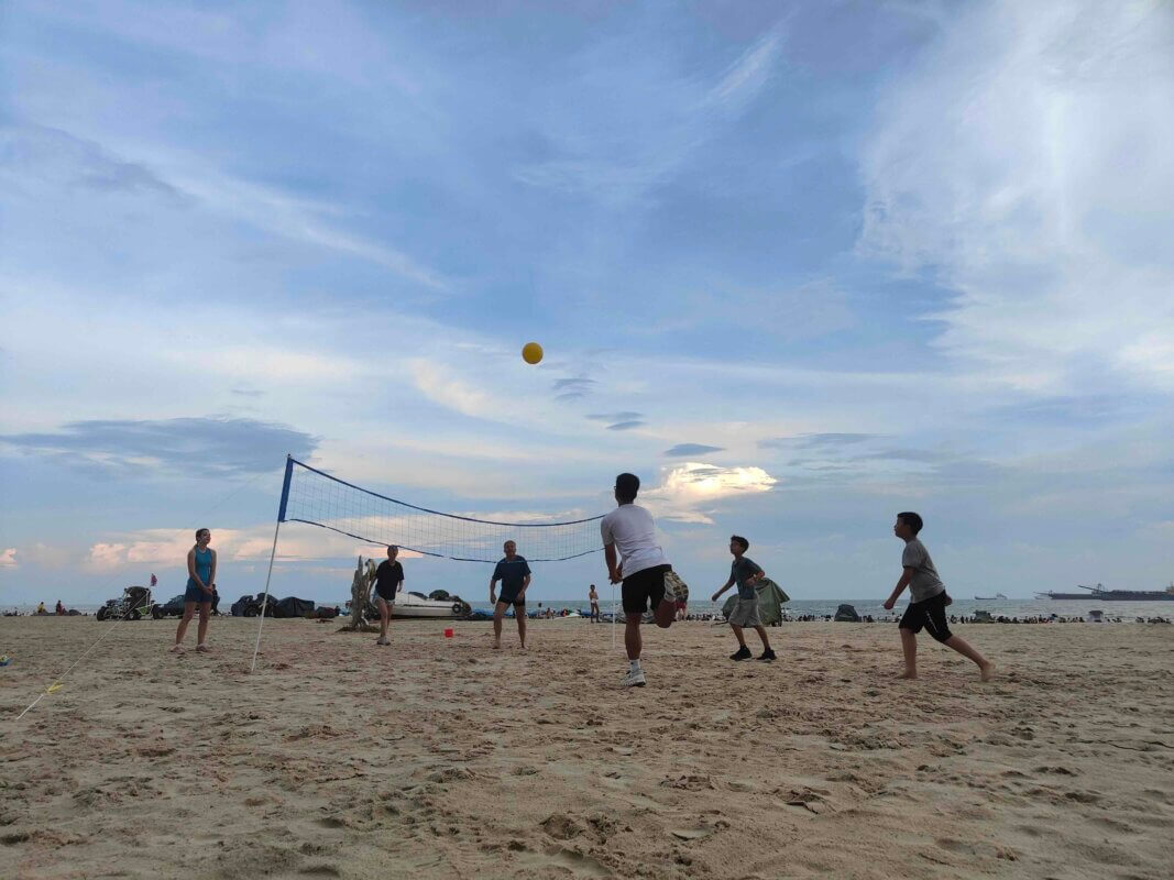 Playing Beach Volleyball