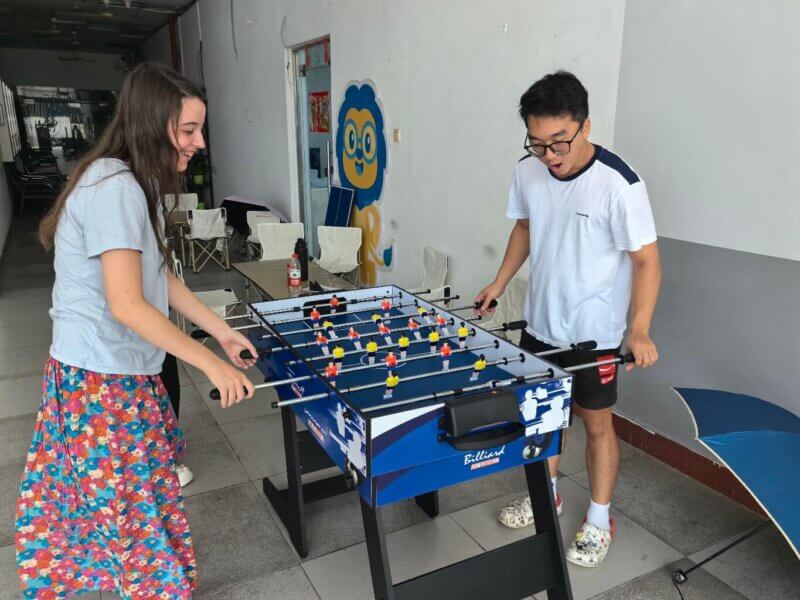 Ava and Jason playing Fussball